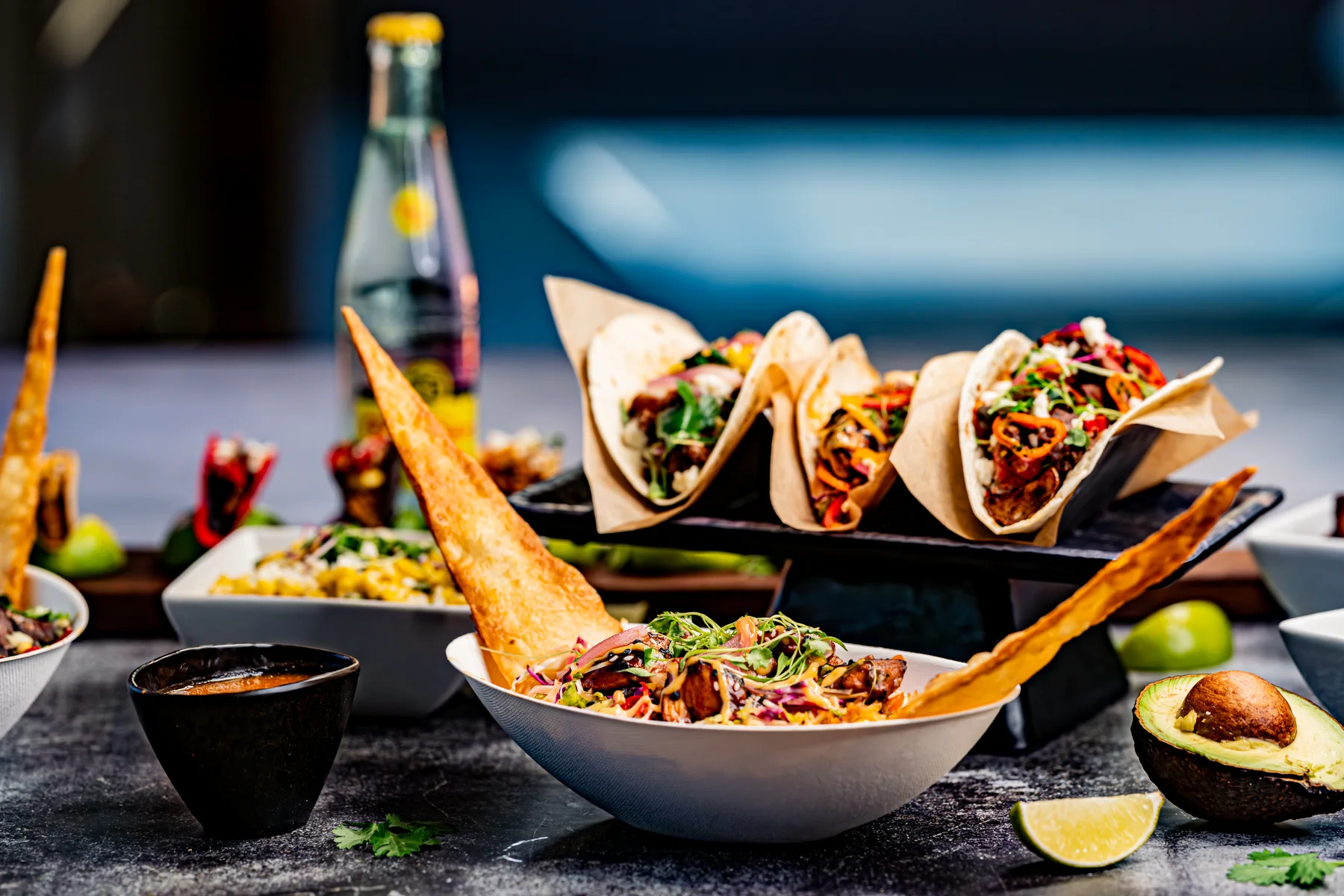A Flora Cantina bowl served with a cocktail